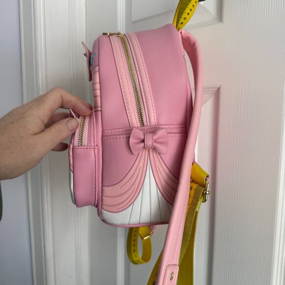 cinderella mice dressmakers mini backpack Exclusive - Zip Around Wallet | Officially Licensed | Plastic/Vegan Leather These furry friends are hard at work making a beautiful backpack for Cinderelly Disney Cinderella Pink Dress Loungefly